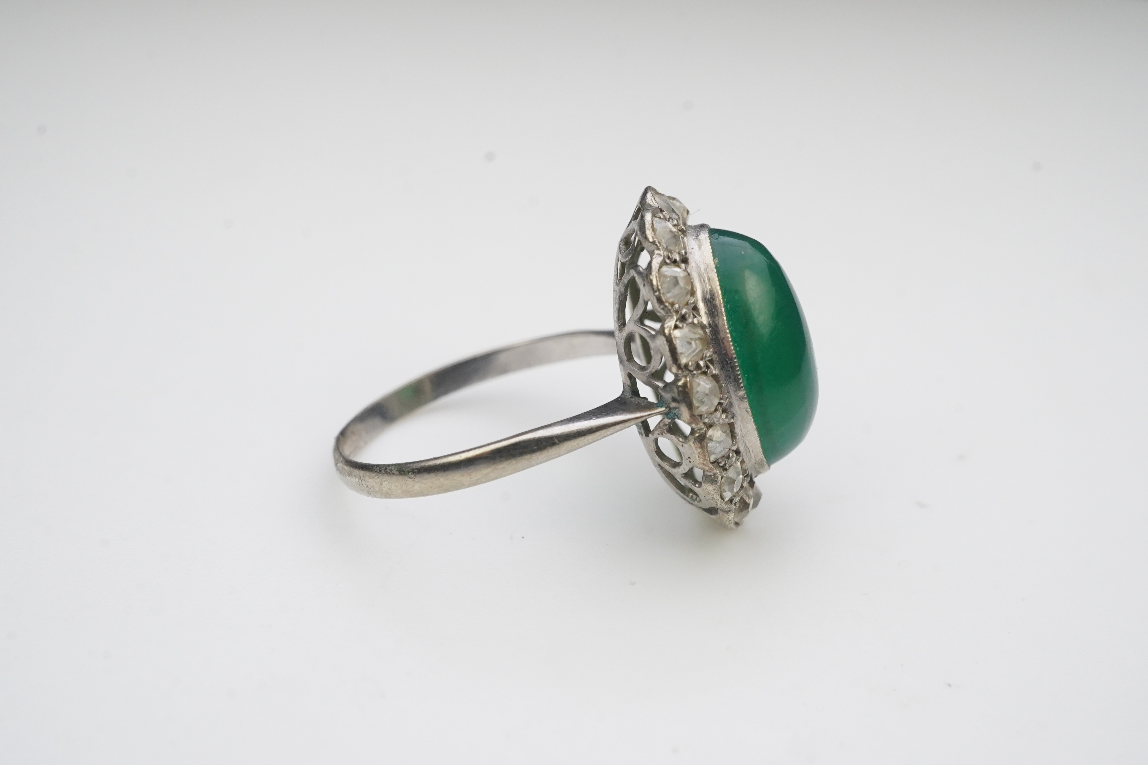 A green chalcedony and diamond ring, early 20th century